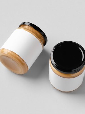 Peanut, almond, nut butter jar mockup with blank label.